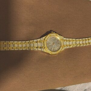 Slightly used gold with Cuban cons costume jewelry very nice for prop use